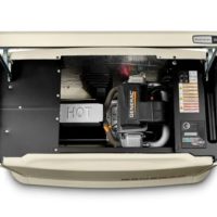 Generac Guardian home standby generator with open enclosure revealing G-Force engine and internal components